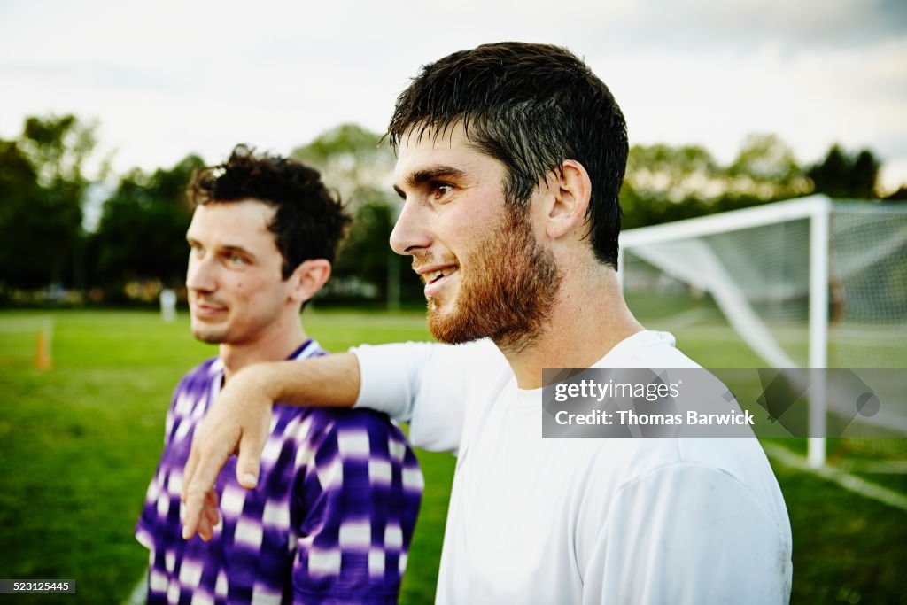 Soccer player with teammate after match