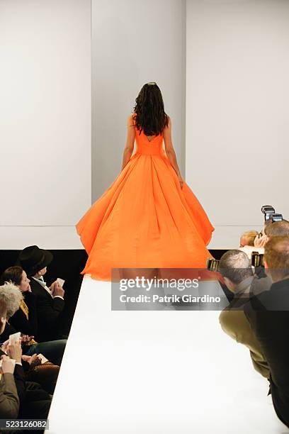 fashion model leaving runway - model fashion show stock pictures, royalty-free photos & images