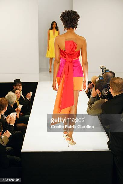 fashion model on runway - fashion show stock pictures, royalty-free photos & images