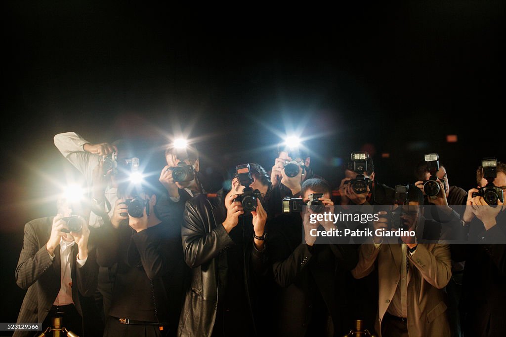 Paparazzi Photographing Celebrities