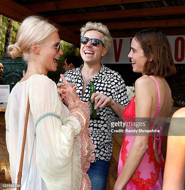 Poppy Delevingne, Nick Grimshaw and Alexa Chung attend the Villoid garden tea party hosted by Alexa Chung at the Hollywood Roosevelt Hotel on April...