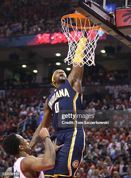 Miles of the Indiana Pacers dunks the ball against the Toronto Raptors in Game One of the Eastern Conference Quarterfinals during the 2016 NBA...