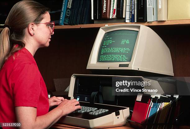 office worker using computer - archival bildbanksfoton och bilder