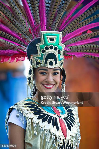 performer wearing aztec costume - aztec headdress stock pictures, royalty-free photos & images