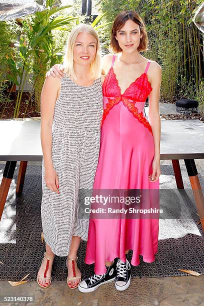 Karin Kallman and Alexa Chung attend the Villoid garden tea party hosted by Alexa Chung at the Hollywood Roosevelt Hotel on April 21, 2016 in...