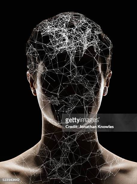 connected lines covering face and brain of male likeness - ai concept - male likeness fotografías e imágenes de stock