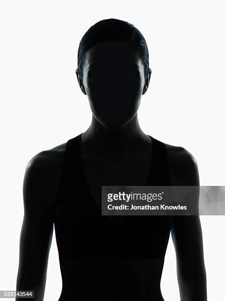 symmetrical studio shot of female silhouette, white background - persona irriconoscibile foto e immagini stock