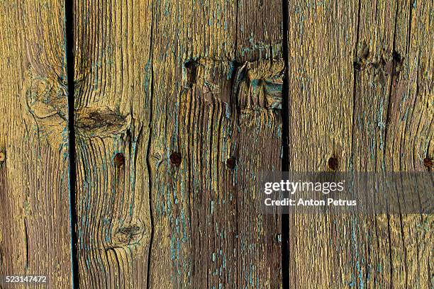 old paint on a wooden wall - tool shed wall spaces stockfoto's en -beelden