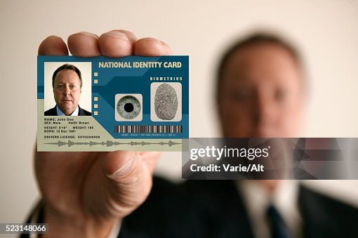 Man Holding Identity Card Man Holding Identity Card