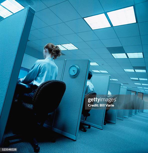 workers in small cubicles - repetition office stock pictures, royalty-free photos & images