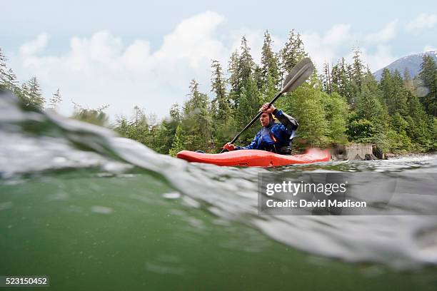 man kayaking in river - kayaking rapids stock pictures, royalty-free photos & images