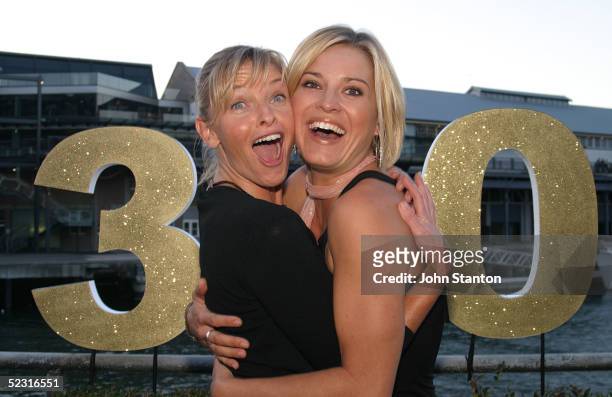 The stars of Australian hit medical drama "All Saints" Tammy Macintosh and Alex Davies pose for a photo to celebrate the shows' 300th episode at...