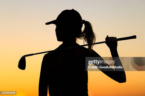 female golfer - women golf stock pictures, royalty-free photos & images