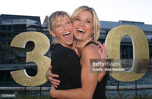 The stars of Australian hit medical drama "All Saints" Tammy Macintosh and Alex Davies pose for a photo to celebrate the shows' 300th episode at...
