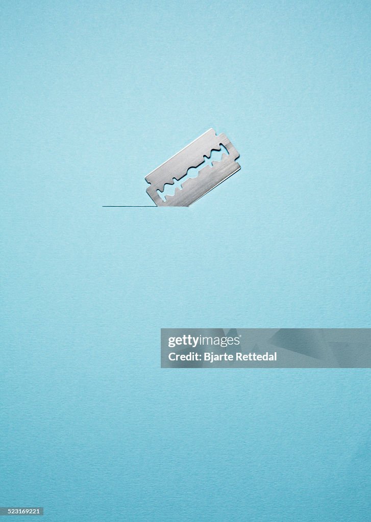 Paper Blade Protector Razor Razor Blade Cutting Paper High-Res Stock Photo - Getty Images
