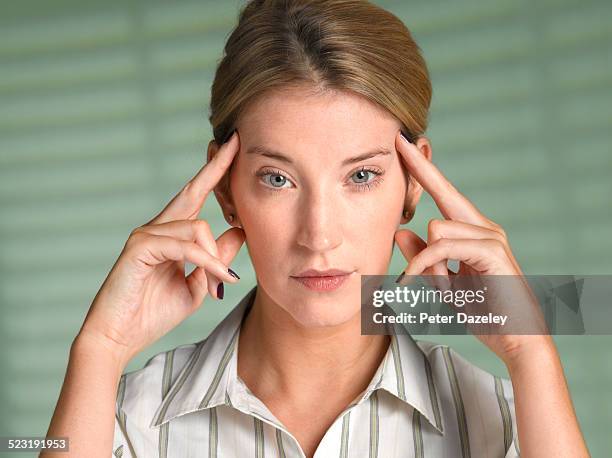 woman staring at camera - selective focus foto e immagini stock