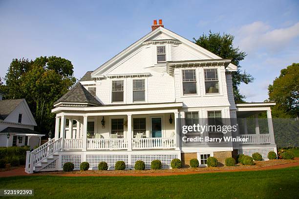 white clapboard house with large porch, cape cod - falmouth america imagens e fotografias de stock
