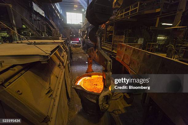 Molten copper sits in a ladle at the Aurubis AG metals plant in Hamburg, Germany, on Thursday, April 21, 2016. China has accumulated most of the...