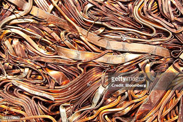 Pressed cube of copper scrap sits ahead of recycling at the Aurubis AG metals plant in Hamburg, Germany, on Thursday, April 21, 2016. China has...
