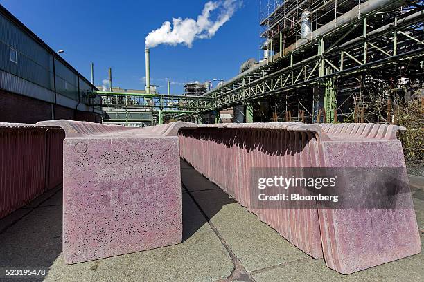 Copper anode plates sit in an outdoor storage yard at the Aurubis AG metals plant in Hamburg, Germany, on Thursday, April 21, 2016. China has...