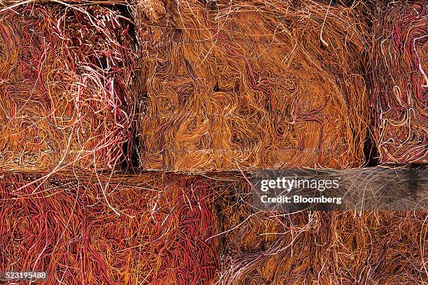 Pressed cubes of copper scrap sit ahead of recycling at the Aurubis AG metals plant in Hamburg, Germany, on Thursday, April 21, 2016. China has...
