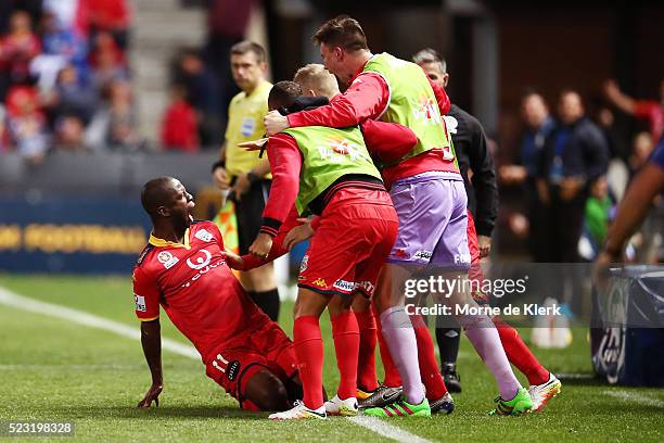 Bruce Djite of Adelaide United celebrates with teammates after scoring a goal during the A-League Semi Final match between Adelaide United and...