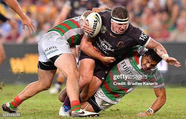 Josh McGuire of the Broncos takes on the defence during the round eight NRL match between the Brisbane Broncos and the South Sydney Rabbitohs at...