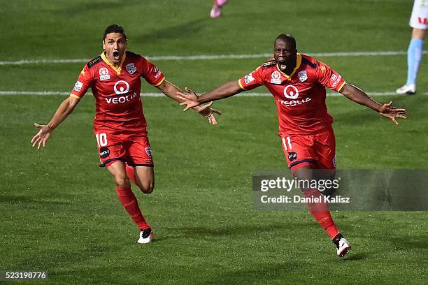 Marcelo Carrusca of United and Bruce Djite of United react after scoring a goal during the A-League Semi Final match between Adelaide United and...