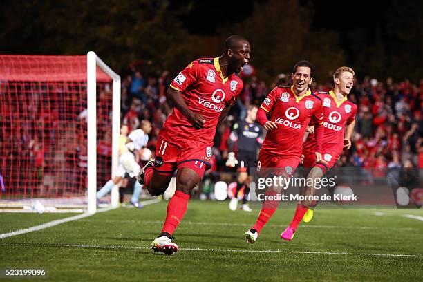 Bruce Djite of Adelaide United celebrates with teammates after scoring a goal during the A-League Semi Final match between Adelaide United and...