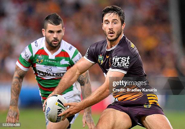 Ben Hunt of the Broncos looks to pass during the round eight NRL match between the Brisbane Broncos and the South Sydney Rabbitohs at Suncorp Stadium...