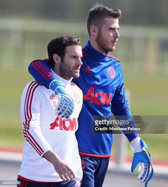 Juan Mata and David de Gea of Manchester United in action during a first team training session at Aon Training Complex on April 22, 2016 in...