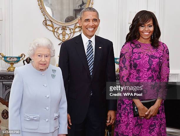 Queen Elizabeth II stands with US President Barack Obama and First Lady of the United States, Michelle Obama in the Oak Room at Windsor Castle ahead...