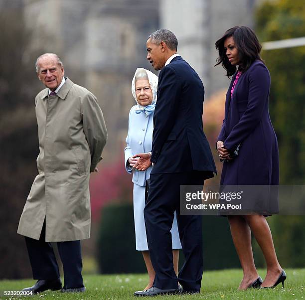 President Barack Obama and his wife First Lady Michelle Obama are greeted by Queen Elizabeth II and Prince Phillip, Duke of Edinburgh after landing...