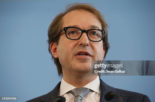 German Transport Minister Alexander Dobrindt speaks to the media to annouce the findings of a commission that investigated the emissions of a wide...