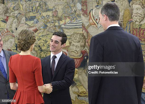 King Felipe VI of Spain and Queen Letizia of Spain receive figure skating world champion Javier Fernandez at Zarzuela Palace on April 22, 2016 in...