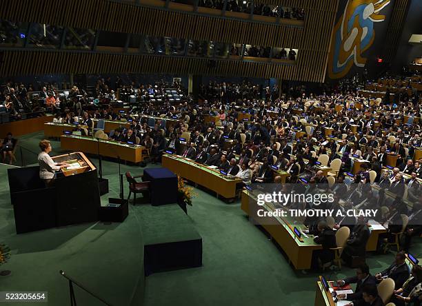 Brazilian President Dilma Rousseff speaks during the high level signature ceremony for the Paris Agreement at the United Nations General Assembly...