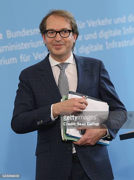 German Transport Minister Alexander Dobrindt departs after speaking to the media to annouce the findings of a commission that investigated the...