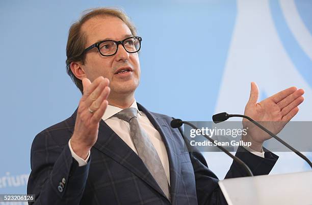 German Transport Minister Alexander Dobrindt speaks to the media to annouce the findings of a commission that investigated the emissions of a wide...