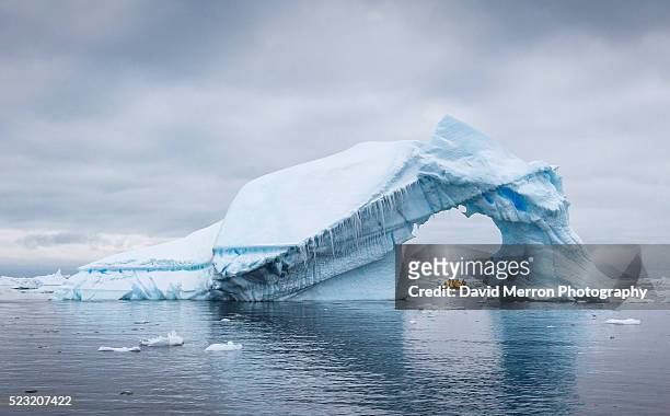 ice arch - antarctica iceberg stock pictures, royalty-free photos & images