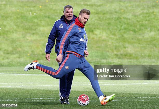 Manager Sam Allardyce watches Jan Kirchhoff during Sunderland AFC training session at The Academy of Light on April 22, 2016 in Sunderland, England.