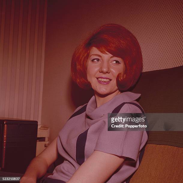 English singer Cilla Black posed backstage during a recording of the television music series 'Thank Your Lucky Stars' at Alpha Television Studios in...
