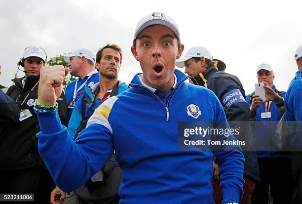 Rory McIlroy celebrates on the 15th green after Europe won the Ryder Cup during the singles on the 3rd day of the 2014 Ryder Cup at the PGA Centenary...