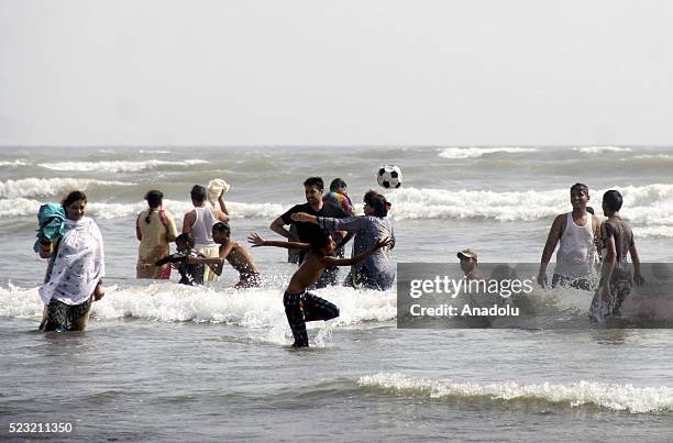 April 22: People cool off at the Clifton beach during a heat wave in Karachi, Pakistan on April 22, 2016.