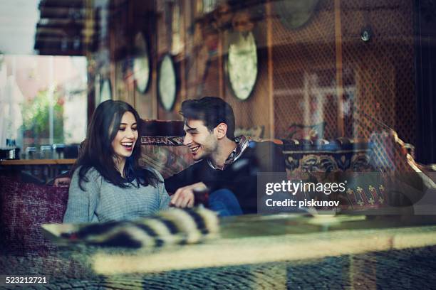 turkish couple in cafe - istanbul tea stock pictures, royalty-free photos & images