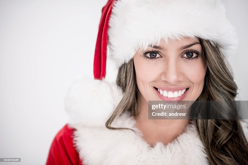 Female Santa looking happy