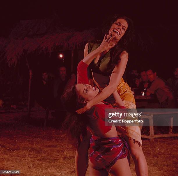 English actress Martine Beswick and Israeli actress Aliza Gur in character as gypsy girls Zora and Vida in a fight scene from the James Bond film...