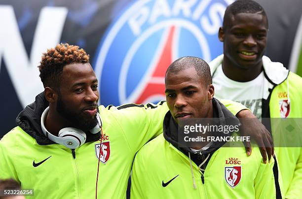 Lille's Ivorian forward Junior Tallo and Lille's French defender Djibril Sidibe leave Stade de France stadium in Saint-Denis, north of Paris, on...
