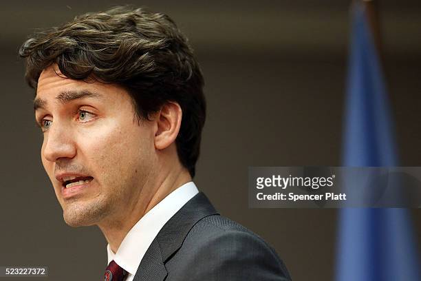 Canadian Prime Minister Justin Trudeau speaks at a news conference while attending the United Nations Signing Ceremony for the Paris Agreement...