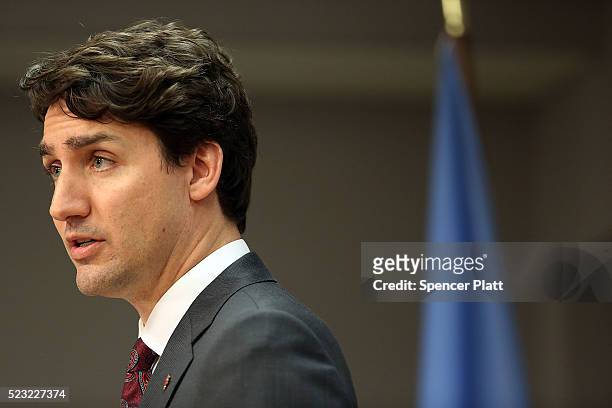 Canadian Prime Minister Justin Trudeau speaks at a news conference while attending the United Nations Signing Ceremony for the Paris Agreement...