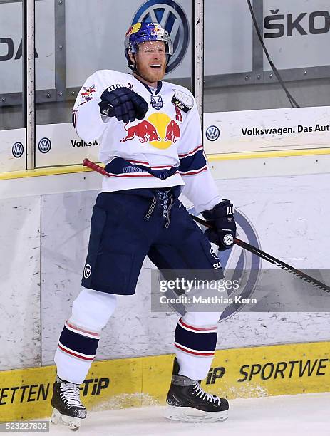 Toni Soederholm of Muenchen jubilates after scoring his teams first goal during the DEL playoffs final game four between Grizzlys Wolfsburg and Red...